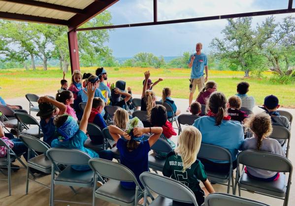 Jon Hager speaking to the kids at Gospel Rocks Ranch.