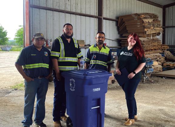 Alonzo Jimenez, Juan Montoya, Jose Rocha and Zoe Killion after a tour of the Recycling Center