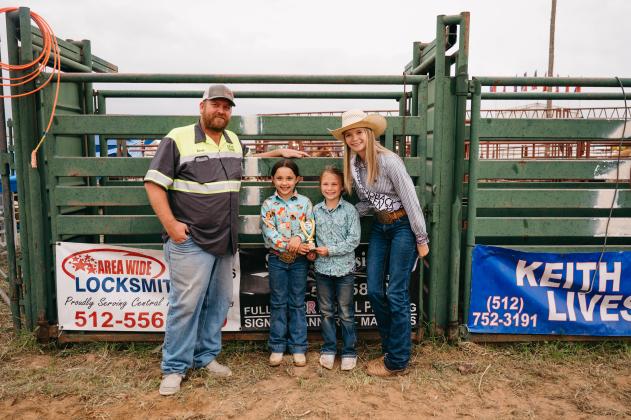 Sponsor SAS Towing Derek Talley and 2023 Diamondback Jubilee Rodeo Queen Jara Wootton award the winners of the Mutton Busting who tied for first place   Blakely Brooks from Lometa and Millie Cole Mueller from Early.