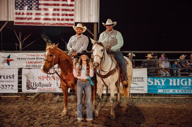 2024 Miss Diamondback Jubilee Rodeo Queen Breck McCoury awarding the buckles to Laramie Allen and Tyler Anderson with a time of 7.53 in the 11th Annual Rattler County Team Roping.