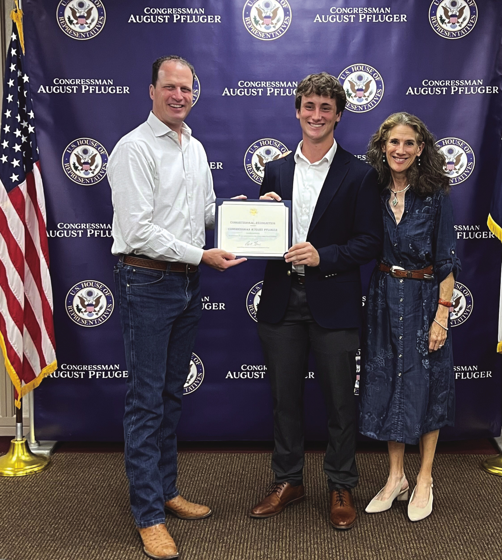 Jefferson Stencil, along with Amy Stencil (his proud mom), is shown here with Congressman August Pfluger who is honoring him at the Meet-and-Greet in San Angelo.