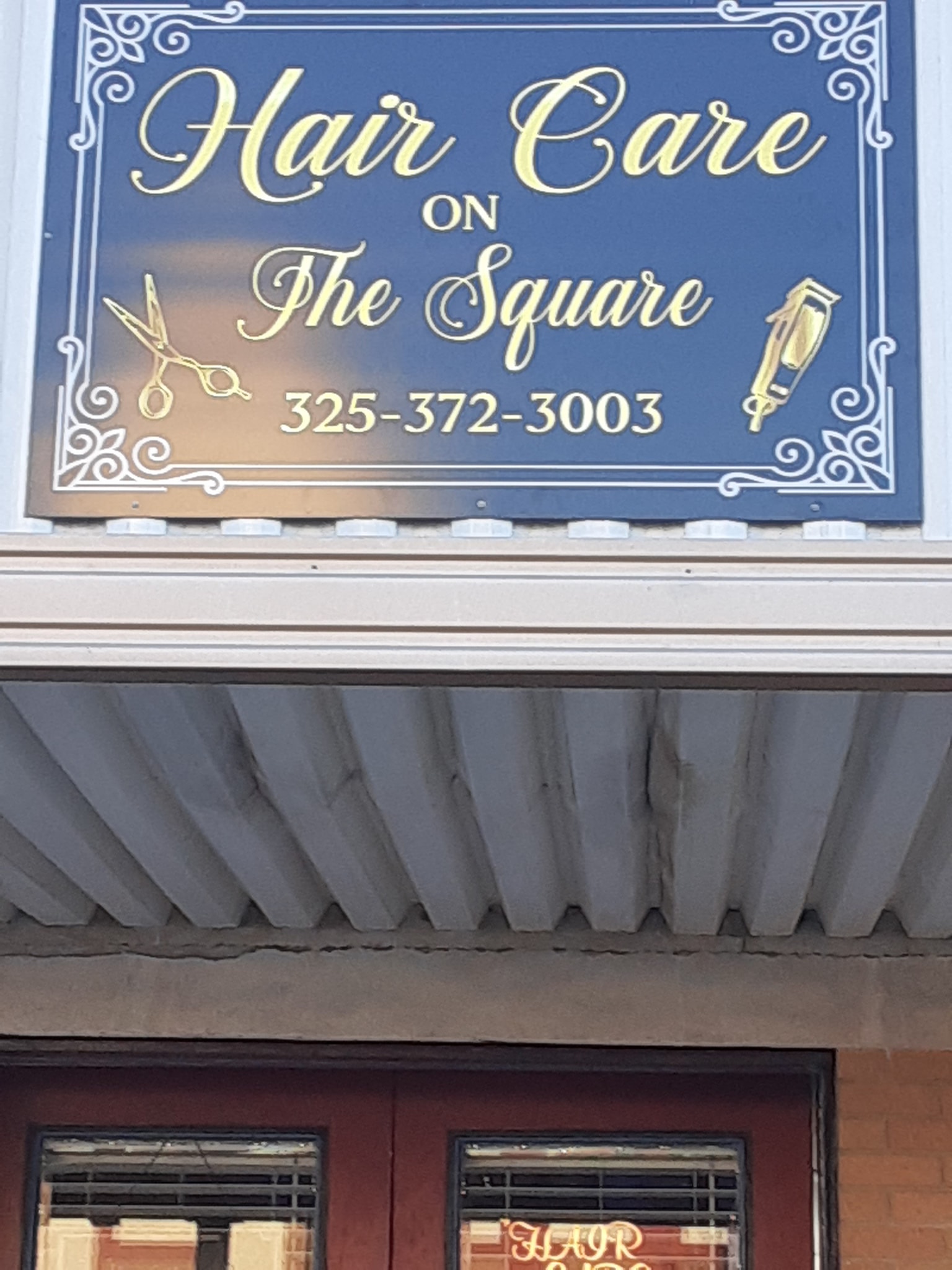 Hair Care on the Square sign