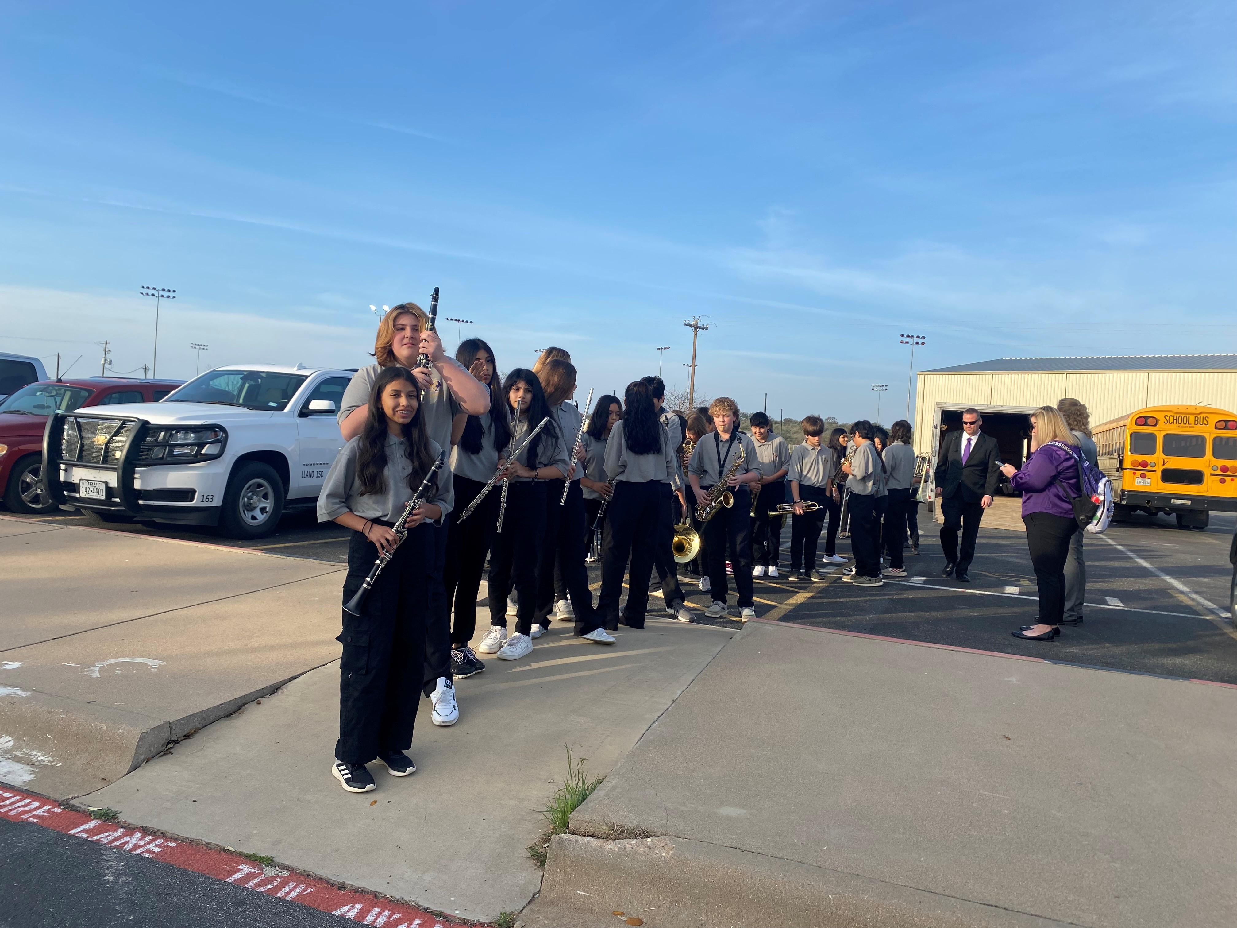 Students lining up to head to the stage for warm-up