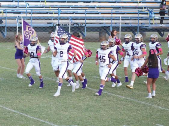 San Saba Varsity Dillos Carrying the Flags — #10 Wesley Lackey and Logan Glover #2
