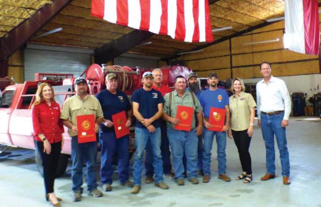Pictured are our special guests and representatives from the area VFDs. (L-R) Shelby Slawson, Chris Stewart (SS Fire Chief), Mike Poe (RS), Winston Poe (RS), Tommy Morrison (Cherokee), David Norris (EG), Colt Broyles (Cherokee), Doug Chapman (EG), Senator Dawn Buckingham and August Pfluger. (Photo by Djuana Payton)