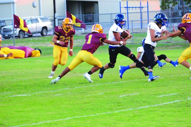 Coyote #14 Brandon Stewart blocking for fellow teammate #3 Braxton Ethridge as he carries the ball in the Richland Springs vs Lometa game last Friday, September 9th.  Photo by Pam Starr