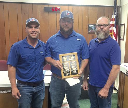 San Saba Employee of the month Cody Mann for November was recognized in the Nov. 12 meeting and presented with a plaque and gift card by Jesse Hunt, water/wastewater department supervisor and alderman Michael Nelson. Photos courtesy of City of San Saba