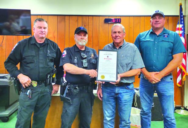 Detective Steve Newkirk, Sergeant Charlie Boyce, Mayor Ken Jordan, and Chief Bauer