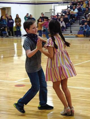 Scout C. and Kinlei V. (4th Grade) two-stepping