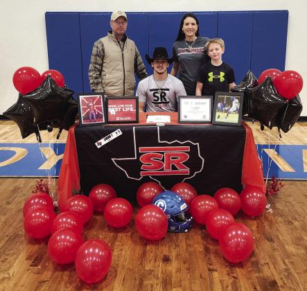 Rode Ligon joined by family members Katie Boswell, Bucky Boswell, and Holdin Boswell at Cherokee High School as he signs with Sul Ross University. Photo by Valerie Valdez