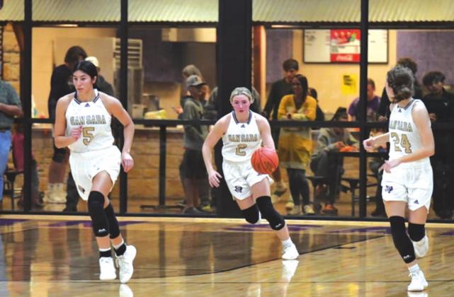 Shown below is San Saba High School girls varsity basketball junior guard Lexy Amthor (2) quickly dribbling the ball upcourt on Tuesday, February 8th, during the Lady Dillos' close 37-35 loss at home to Mason High School. (Photo by Rita Boultinghouse)