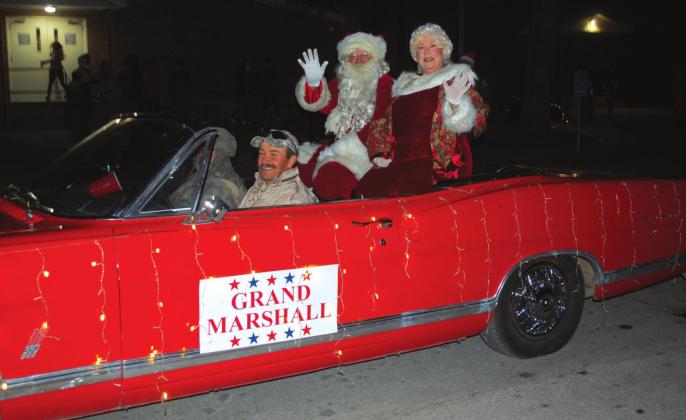 Christmas Extravaganza deemed a huge success; visitors and locals enjoyed Sip N’ Stroll, school choir, Santa’s Workshop, and lined Wallace Street to see dazzling parade