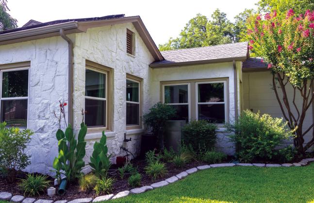 Seen here is the side flowerbed of the Yard of the Month. Courtesy of Karen Sloan