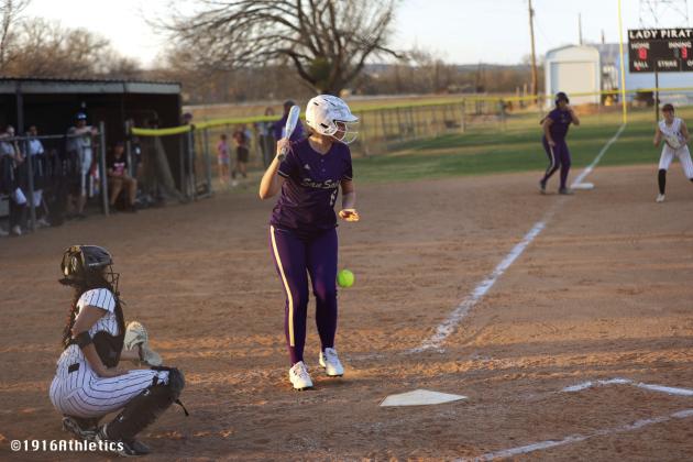 Addy Hay takes a pitch to the leg to advance to first base