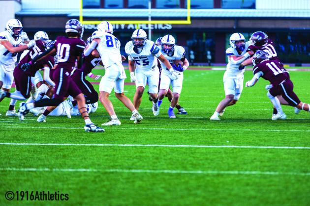 #88 Danny English - #0 Jason Everett blocks open the running lane for #2 Graden Lebow with #55 Jose Vega and extra block coverage.
