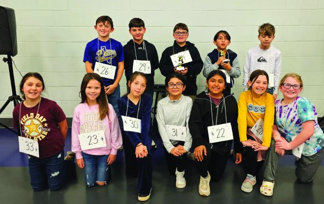 Fourth grade contestants back row (l-r): Remington Nelms, Sloan Sanderson, Wyatt Ward (champion), Aaron Patino (2nd place), Warren Uli. Bottom row (l-r): Emmaline Ketchum, Molly Mays, Sabella Cox, Jocelyn Correa, Yadira Macias, Harper Brown and Everleigh Vallenavedo. Not pictured is Jose Aguilar. Courtesy of Cecilia Bessent