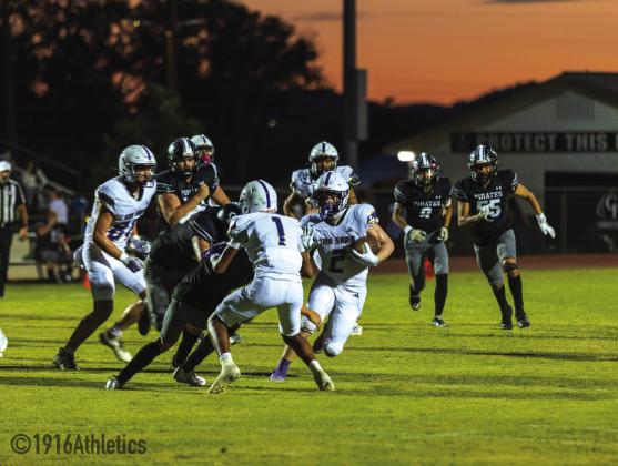 #1 Rome Hatten makes a block for #2 Graden Lebow. Lebow had 131 yrs, 1 TD, 5 Tackles in San Saba’s 60-0 win over Center Point Friday night.