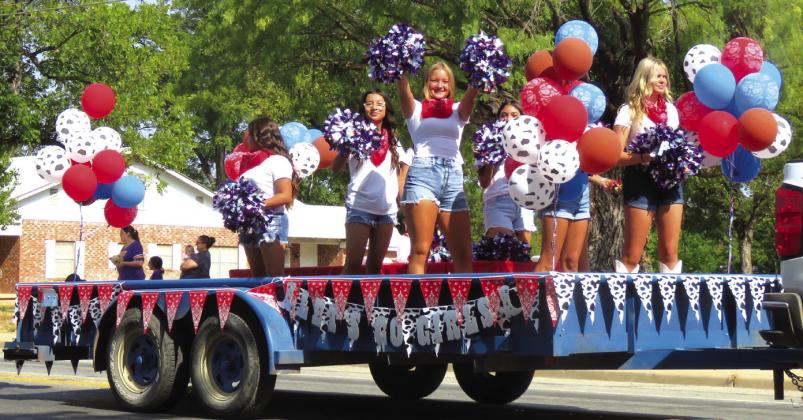 Are you ready for some football? Junior high cheerleaders perform during San Saba Rodeo Parade 2023. Courtesy of by Chino Z