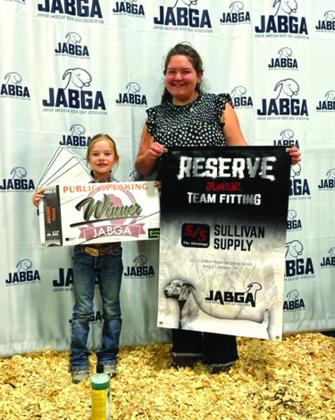 Clara Murray with her banners at the JABGA Regional show in Abilene
