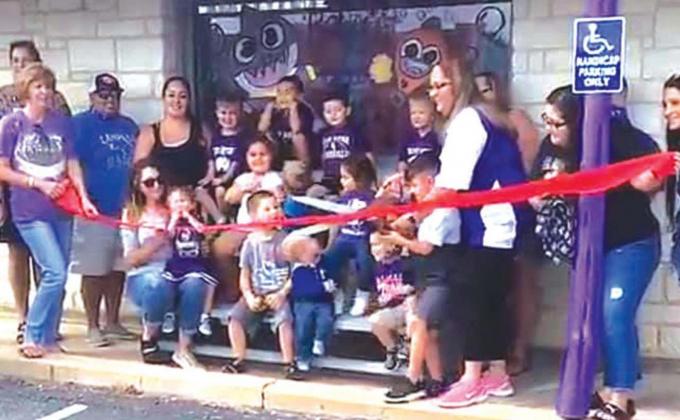 Attending the event (some shown and some hidden!) were: Gaylee (GiGi) Jimenez (with scissors), Misty Everett, Marianne Deans, Veronica Rosales, Jill Wahram, Janna Hernandez, Edika Hernandez, Daniel Barrier, Cynthia Weatherby, T Noel Wood, Cindy Higgenbotham and Shelby Cisneroz.