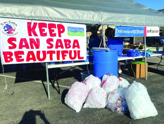 Cleanup Tent and some bags of bottles submitted for the Beverage Bottle Recycling Challenge