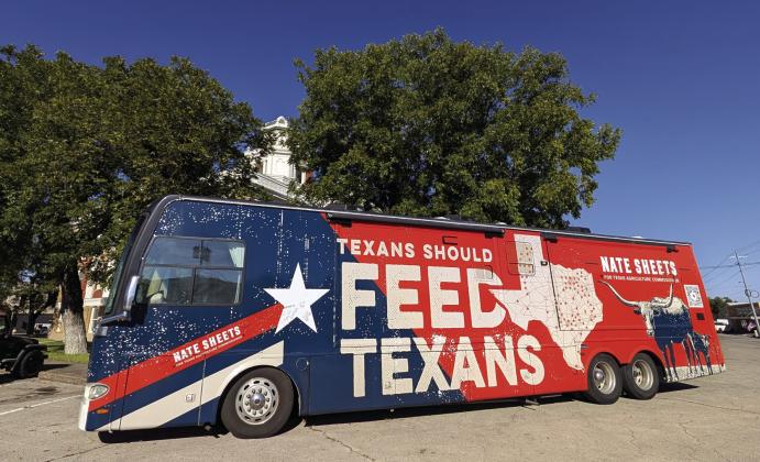 Nate Sheets campaign bus was parked outside the San Saba Courthouse during this visit. Photo by Yvonne Contreras