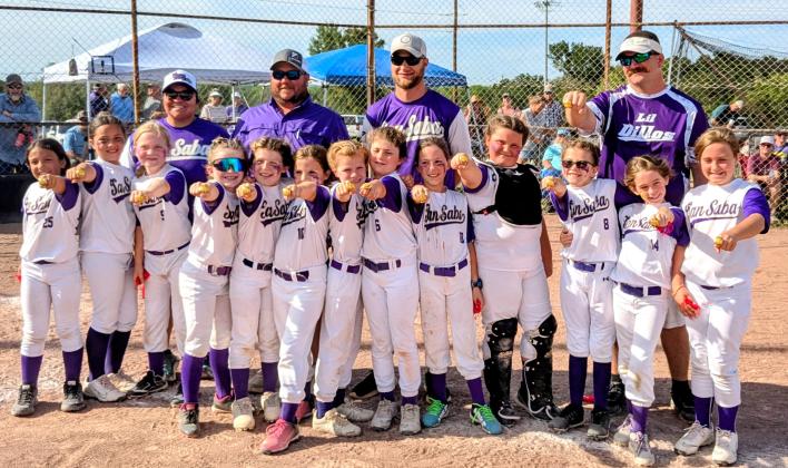 Team picture with championhip rings: Back row - Coaches Rosie Huff, Jack Huff, PJ Fuller, and Christian Bohannon; Front row- Abby Rivera, Morgan Huff, Gentry Bohannon, Mesa Tindall, Aspen Hoyt, Paxley Weeks, Abby Fuller, Hadley Craft, Audrey Wojhan, Teagan Borel, Paisley Ward, Faith Dobbs, and Emily Walters Courtesy of Jessica Fuller