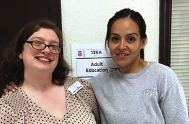 Cynthia Gutierrez (right) shares a smile with Sarah Brown, one of her instructors in the Central Texas College Adult Education program, after earning a general education development (GED) high school equivalency diploma.