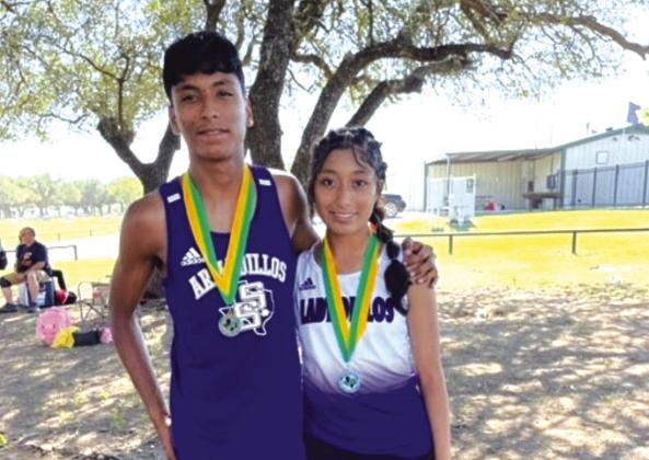 Eric and Kelyn Olalde with their medals Photo courtesy of Renne Ham