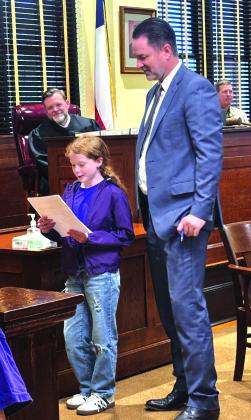 Attorney Marcus Wood and Dakota Gage defended Mrs. Wells.