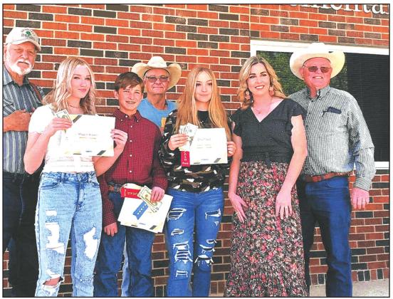 Junior Category Essay Winners Richland Springs ISD, L-R Maggie Bryant 3rd place, Jasper Parrish 1st place &amp;amp; 2nd Place Area, Naomi Ramsey 2nd place