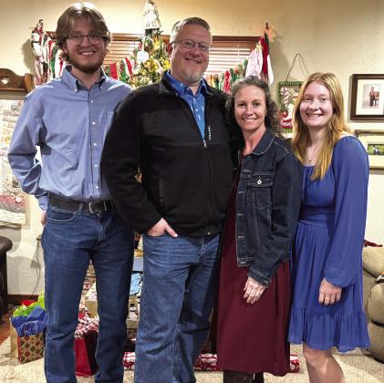 Michael Warren, the new Executive Director of Cherokee Home for Children, is seen here with his wife, Melanie, and their children, Merrick and Micah. Welcome, Warren family, to San Saba County! Courtesy of Janice Hull