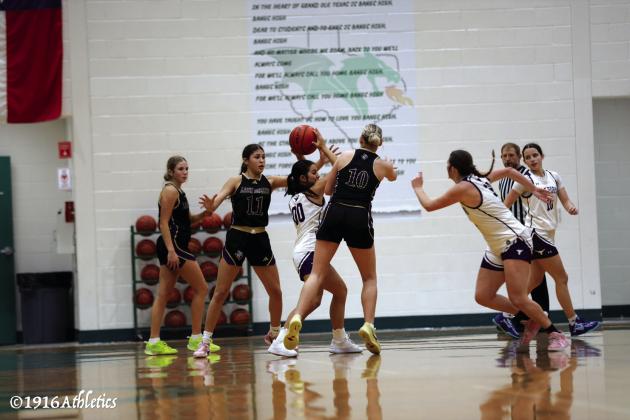 Lady Dillos Basketball action