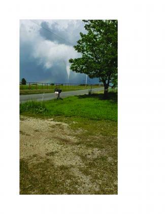 A tornado rips through Madill, one resident caught it on camera. This is on Biles Road. *Photo courtesy of Bobbylee Skinner*