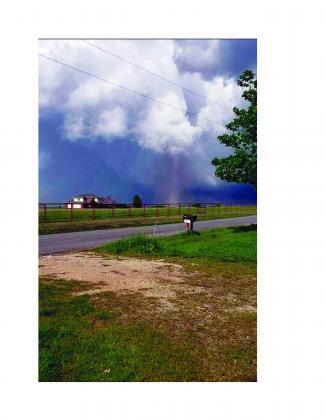 A tornado rips through Madill, one resident caught it on camera. This is on Biles Road. *Photo courtesy of Bobbylee Skinner*
