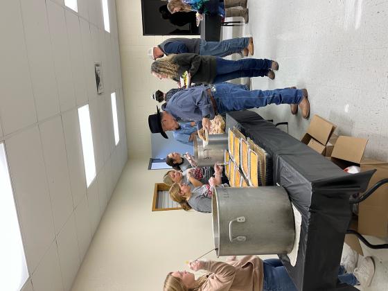 Inside the Civic Center meeting room, our young volunteers mounded guests plates with a "wild; variety of foods.
