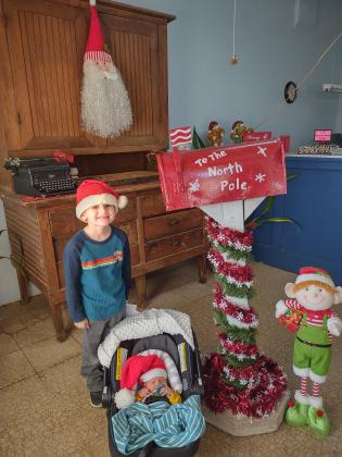 Brantley Shannon brings his baby brother Keaton to deliver his first Letter to Santa.