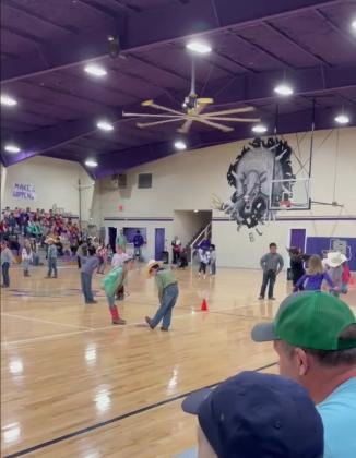 1st grade students square dancing