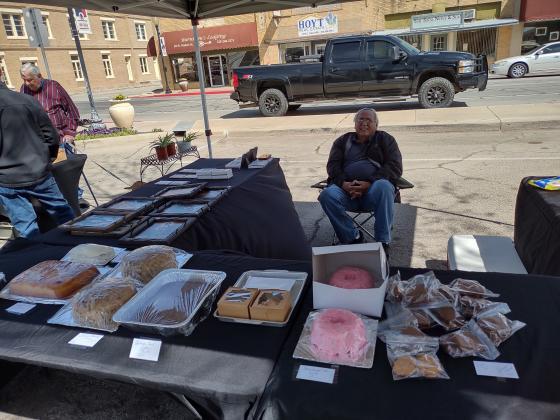 Sarah Saldivar's brother Anselmo Martines was manning her booth which had brownies, cookies, and cakes, as well as some wall decor.