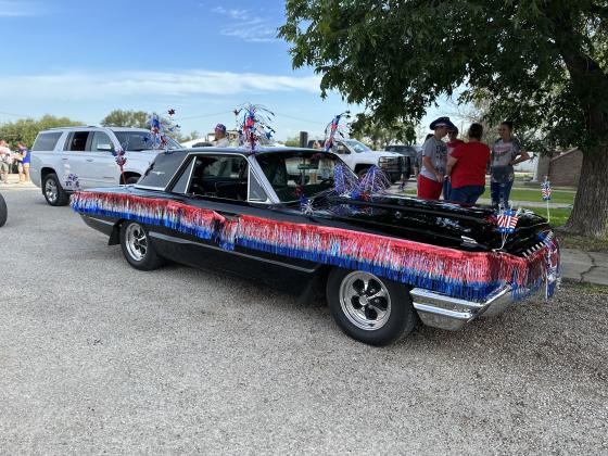 Most Patriotic Float ~ Black Beauty, a 1964 Thunderbird