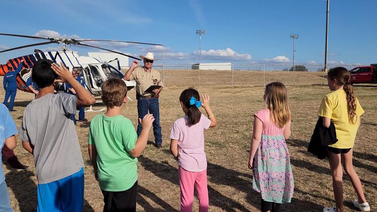 Sheriff Jenkins swearing in Junior Deputies in San Saba