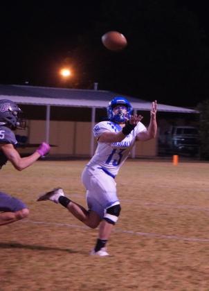 Senior Brady Johnson catching a long pass in the bi-district championship game against Zephyr - Photo by Valerie Valdez