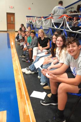 Veterans Day planning committee and participants Samuel Thornton, Avery Wilson, Adelynn Merriman, Mandi Fry, Phoebe Valdez, Jaxon Owen, Chris Oakman, Taylor Randolph, Ella Owen, Marley Huron, Ella Graves, and Uriah Valdez – photo by Valerie Valdez