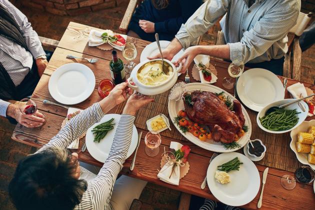Enjoying a good meal and connecting with loved ones at Thanksgiving or similar celebrations can contribute substantially to a person’s overall sense of meaning. Getty Images