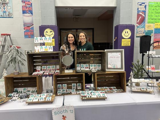 Audrey Smith and April Reyes with their Homespun Clay Earrings