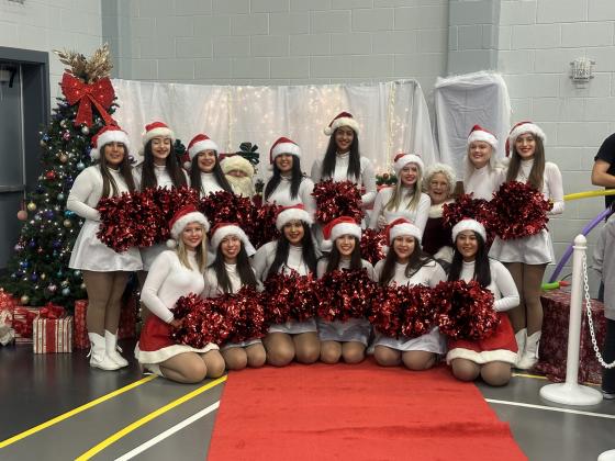 SSHS Dilloettes, led by Kaytlynn Murray, with Santa and Mrs. Claus