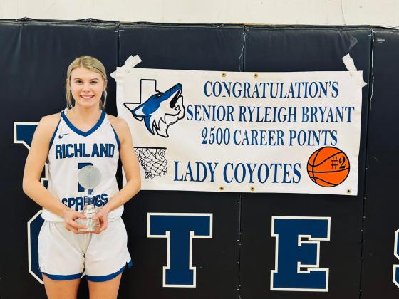 Ryleigh Bryant received 2,500 career points before her last game in the Coyote gym.