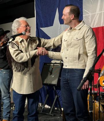 Country Music Entertainer Darrell McCall welcomes Matti Friberg from Avesta, Sweden, to the Heart of Texas Country Music Festival.  Courtesy of Tracy Pitcox