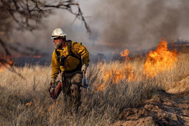 Firefighters battle the Smokehouse Creek Fire on Saturday, March 2, 2024, in Hemphill County, Texas. Sam Craft/Texas A&amp;M AgriLife Marketing and Communications