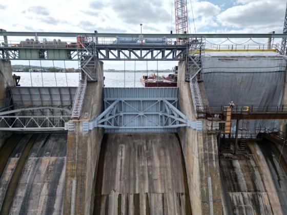 The first of 10 new floodgates is in operation at Wirtz Dam in Burnet County. The new floodgate is in the middle. On the right is the next floodgate to be replaced.